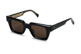 Three-quarter view of Ming square frame with chunky black acetate construction and brown smoked lenses