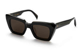 Three-quarter view of Renae cat-eye frame with chunky black acetate construction and brown lenses