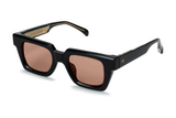 Three-quarter angle of Ming in black acetate with thick square build and rust toned lenses